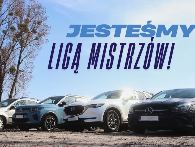 Widok samochodów zaparkowanych na parkingu.